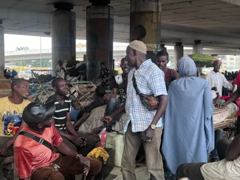 Monday Idara/BBC People under the bridge in Lagos