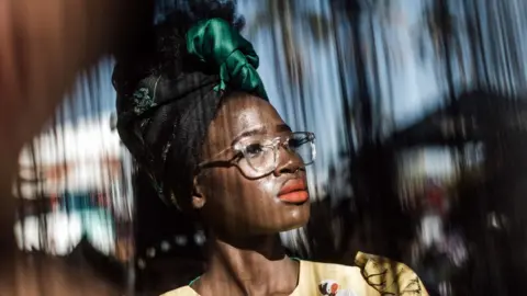 Getty Images A model presents a creation by local designers during a fashion show in Durban, on July 6, 2019.