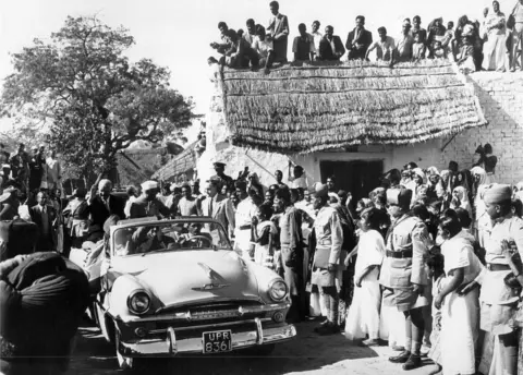 US Embassy Archives President Eisenhower drove in open car to small village to get a glimpse of rural India on December 13, 1959.