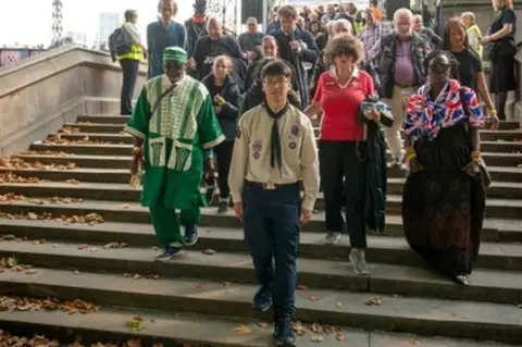 Hampshire Scouts Enver Eng leading the queue