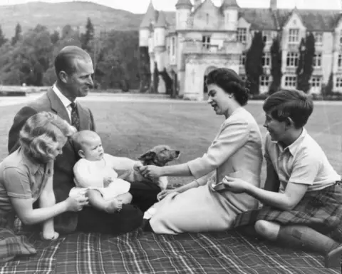 Getty Images Queen Elizabeth II and Prince Philip with their then three children at Balmoral in 1960