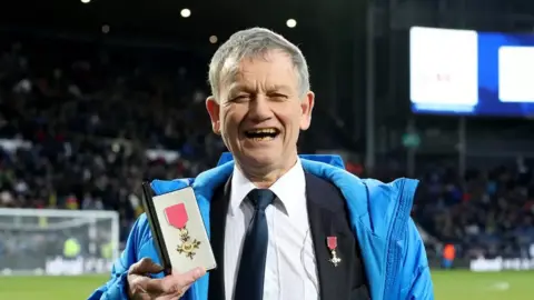The Albion Foundation Blind Dave with his OBE