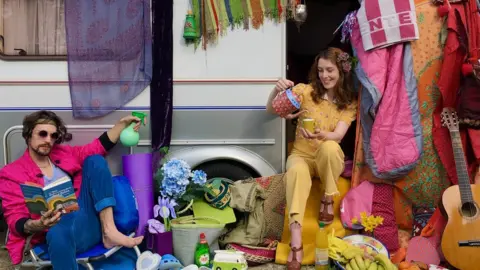 Helen Yang Helen Yang and Thomas Etheridge in multicoloured clothes