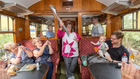 Getty Images Elaine Ball takes part in The Queen's Baton Relay as it visits Bridgnorth